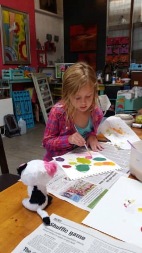 Sydney hard at work painting at a workshop.  Great concentration Sydney!